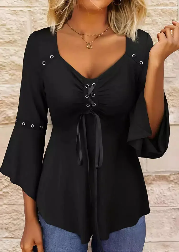Virginia® | Simple black top with a V-neck